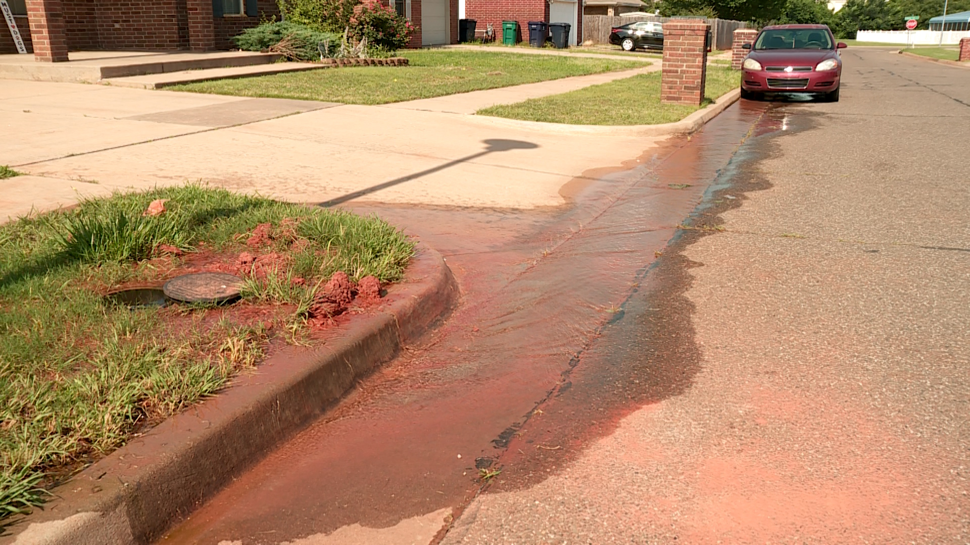 OKC woman says busted water meter has been flowing for a month. Image KFOR.