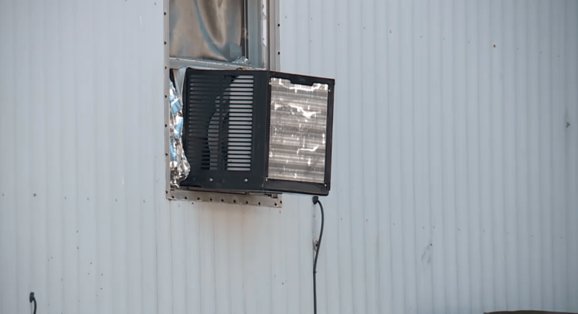 Air conditioning unit in window. Image KFOR.